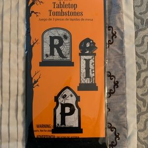 Three piece set of table top tombstones